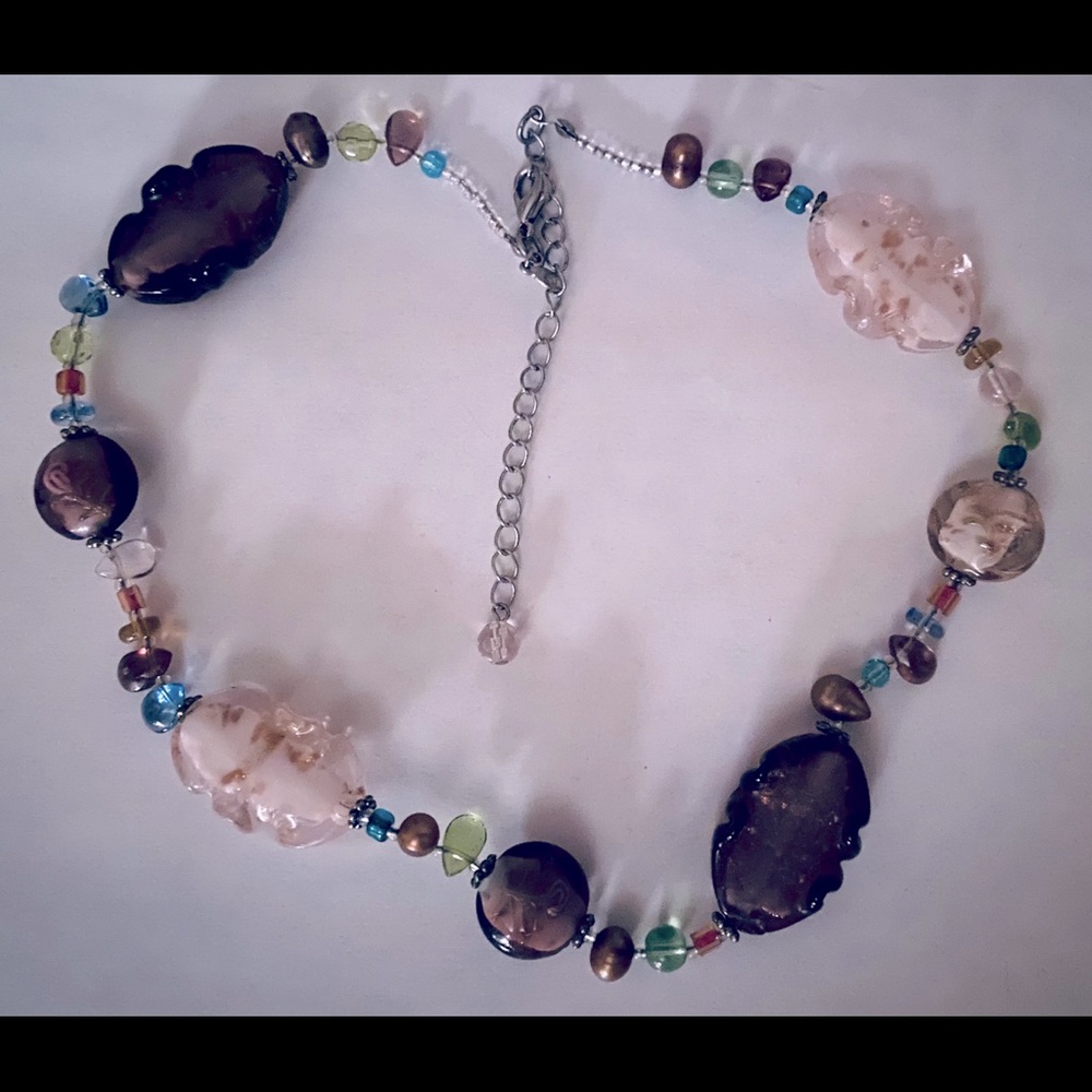 Beautifully detailed purple and pink necklace.